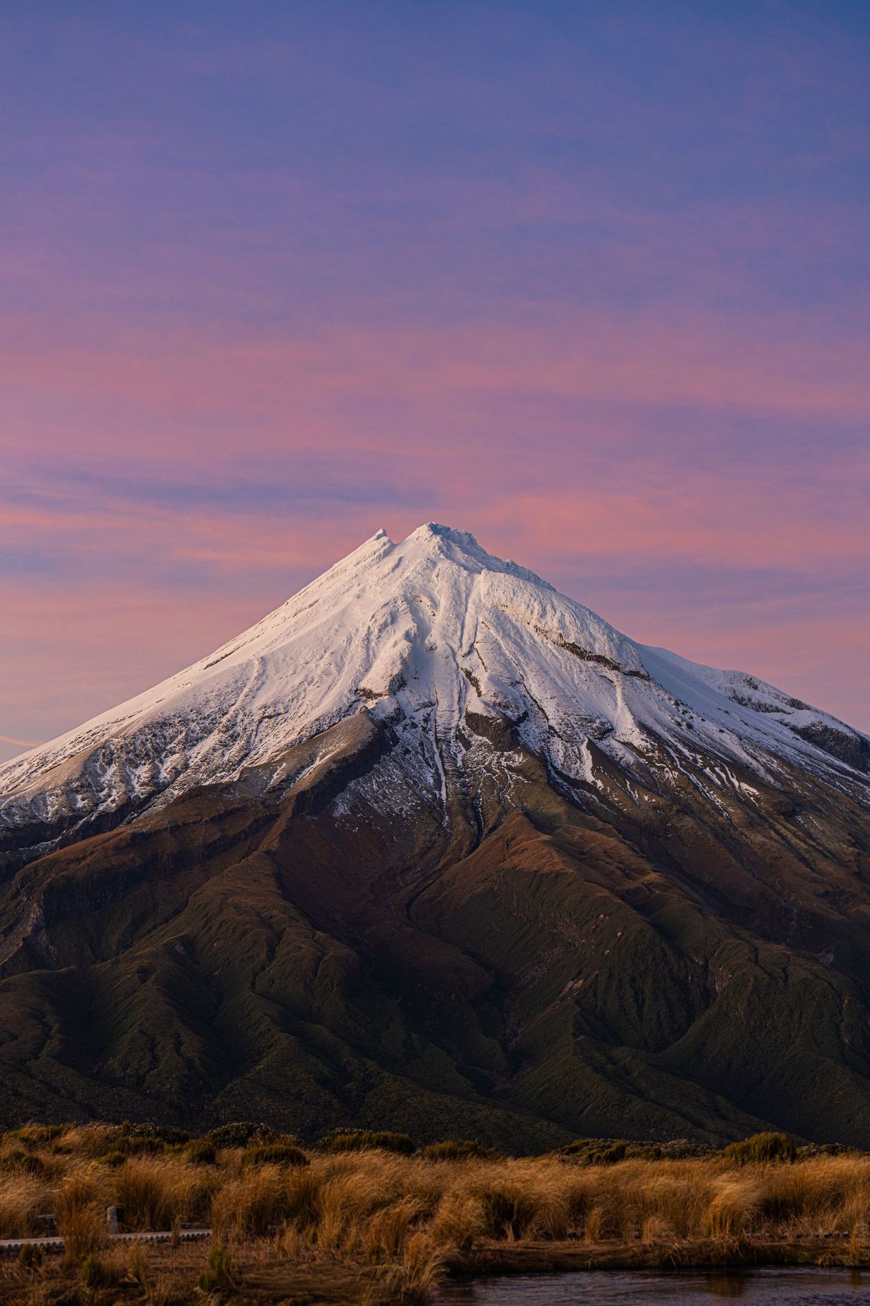 Mount Taranaki in New Zealand at dusk.